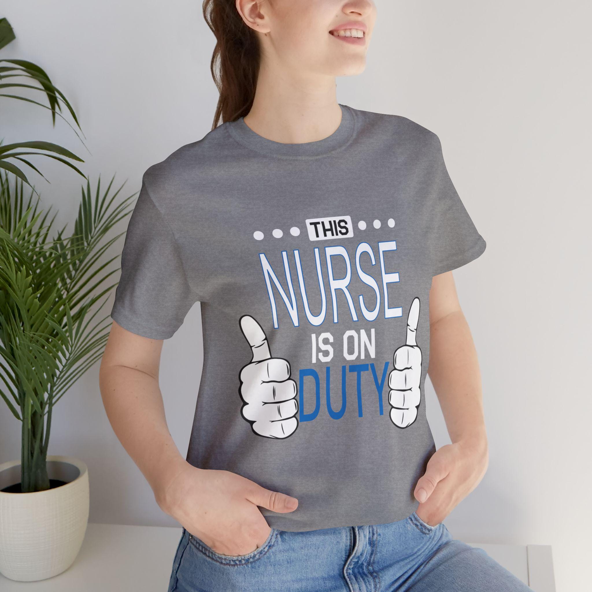 This Nurse Is On Duty T-Shirt | Nurse Thumbs Graphic Tee